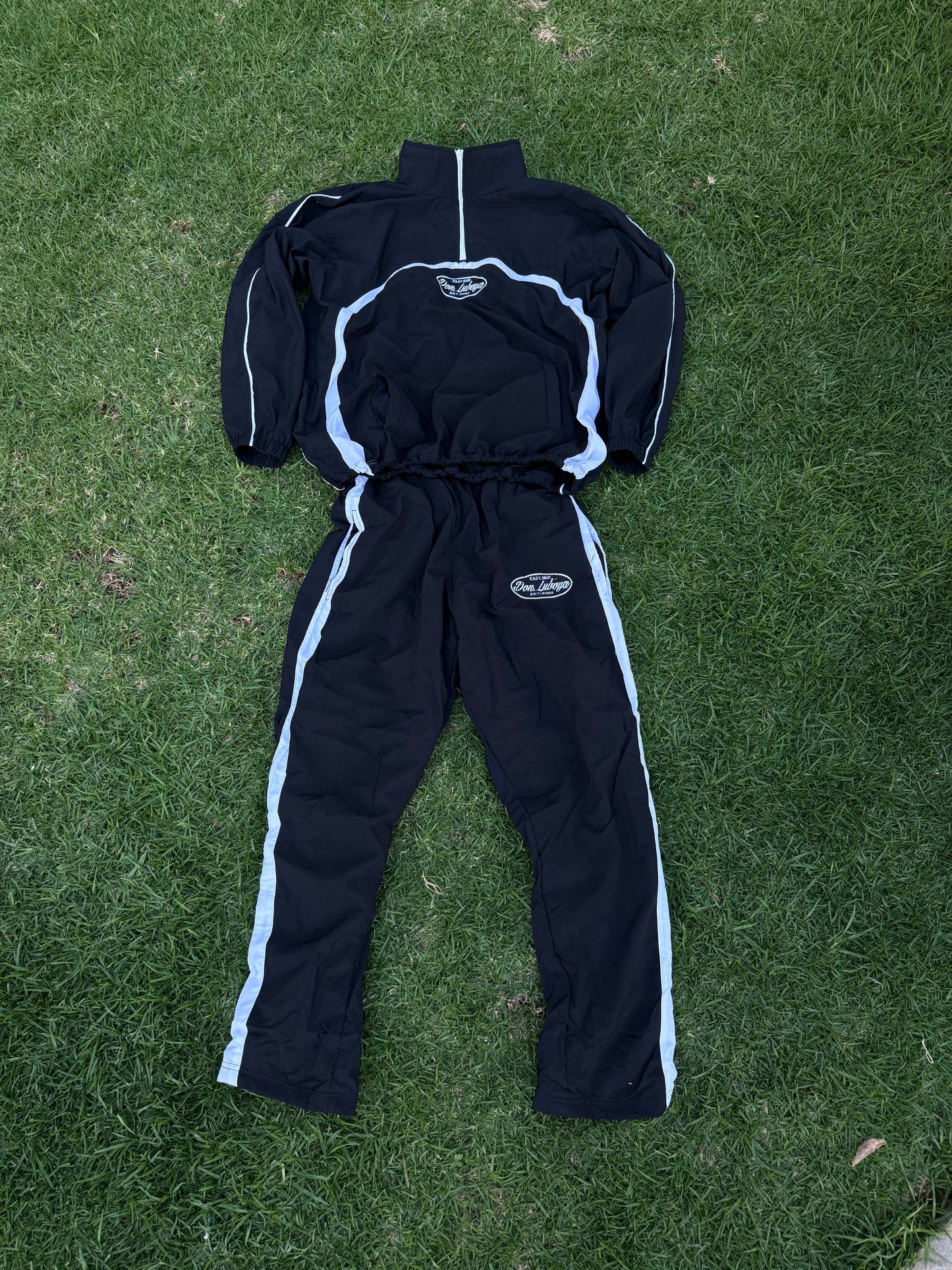 Don Luboya black tracksuit