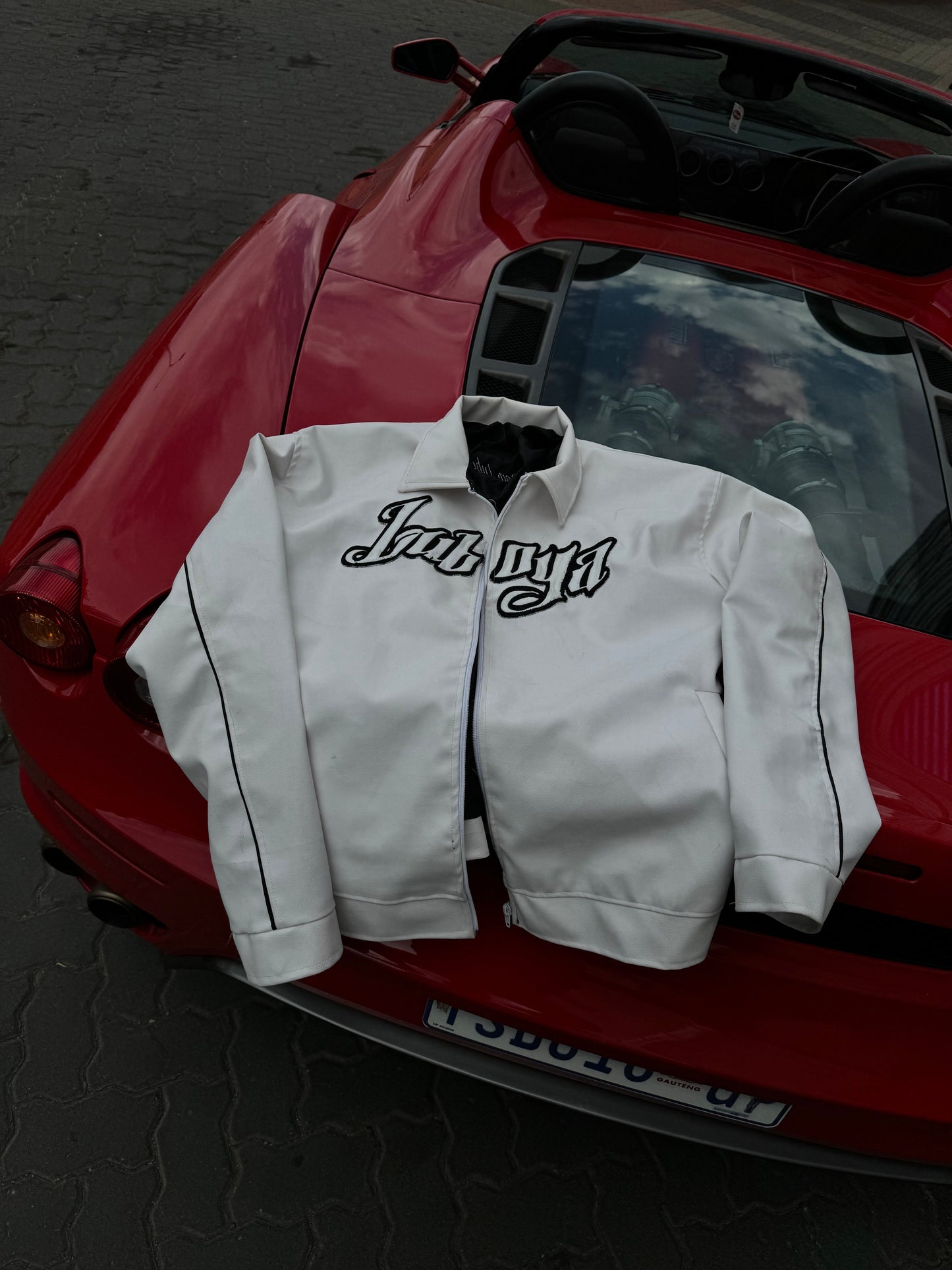 Don Luboya white Rockstar jacket