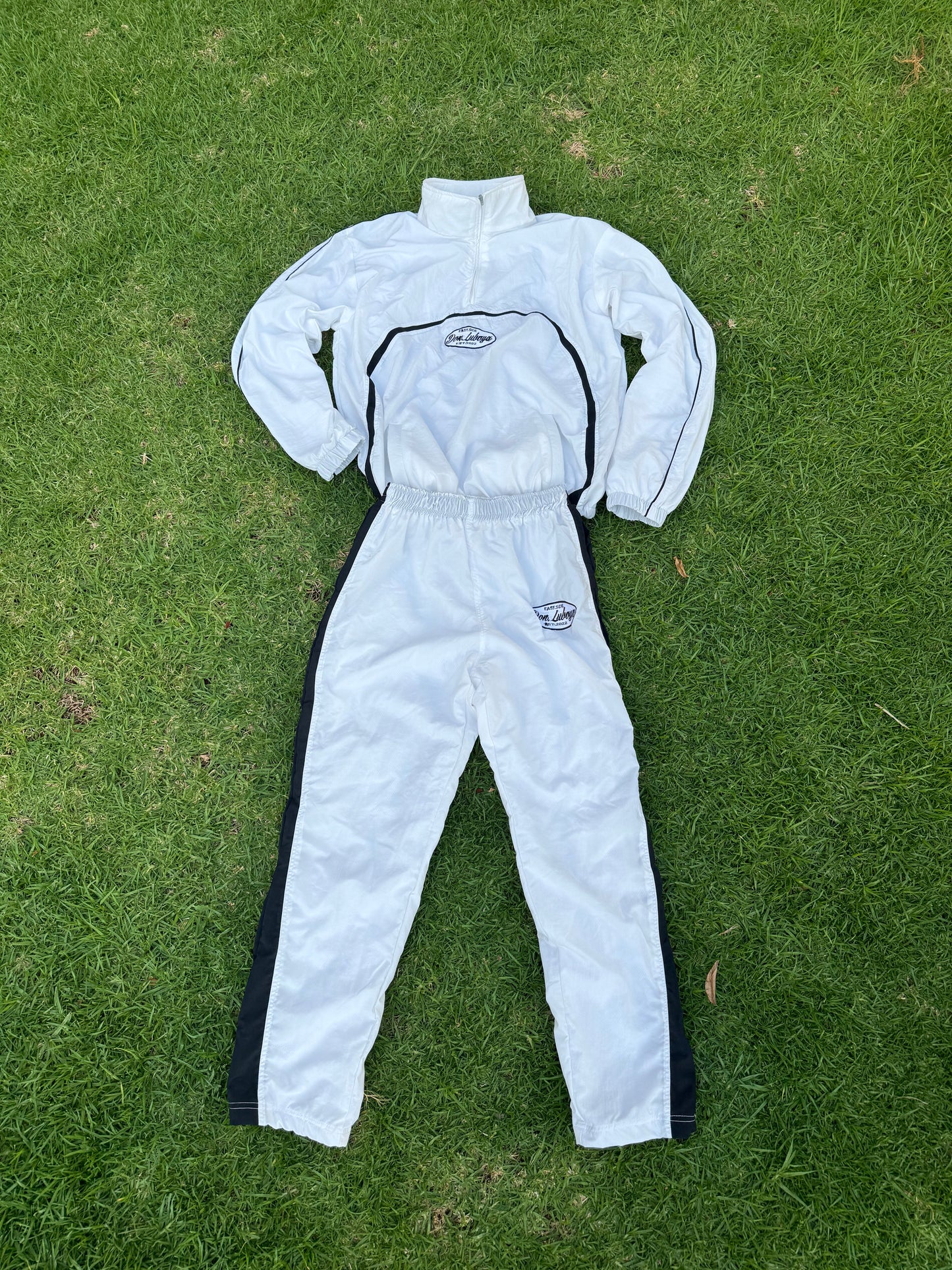 Don Luboya white tracksuit